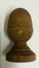 Treated brown wooden acorn - treated,