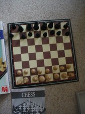 BOXED CHESS SET, FOLDING BOARD,. made by JUMBO games.  including rules.