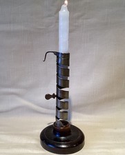 A 19th Century French Wrought Iron Spiral Pigtail Candlestick with Poussoir