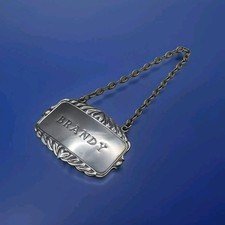 Sterling Silver Brandy Decanter Label by Crisford & Norris Ltd 1975