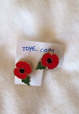 Two poppies pin badges