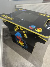 PAC Man tm Head to Head Cocktail Table Machine by Arcade 1up used 12 games