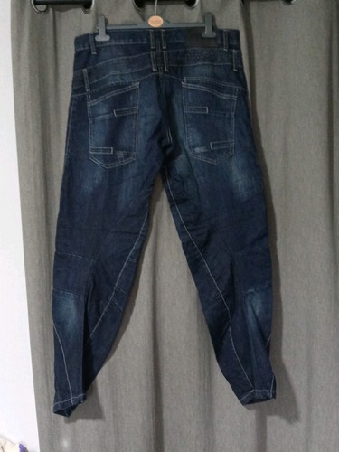 Crafted twisted leg dark wash