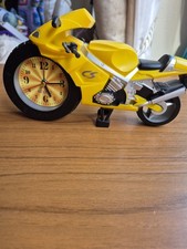 Yellow Motorbike With Quartz Clock In Front Wheel. Battery Operated.
