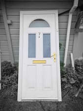 white composite door and with PVC frame , size 924 mm wide x 2080m high .