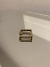 A 9ct Gold Square Ring With Princess & Baguette Cut Diamonds