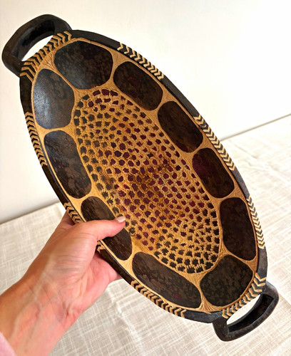 Hand carved wooden oval - hand,