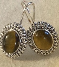 * Avon Tiger Eye Brown Bezel