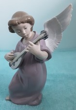 Lladro figurines #5491 "ANGEL PLAYING MANDOLIN"