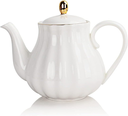 Porcelain tea pot with - tea, infuser