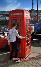 PHOTO  BRIXHAM OLD RED TELEPHONE BOX ONE OF THE LAST REMAINING OLD RED TELEPHONE
