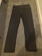 A Black Pair Of Jeans From