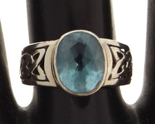 Sterling silver ring blue faceted stone Celtic knot design on shoulders size O