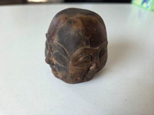 Stone statue faced - 4,