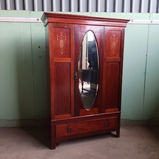 An Edwardian mahogany and inlaid wardrobe