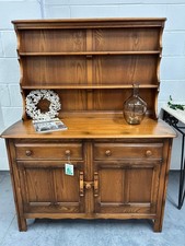 A vintage ERCOL Teak dresser two drawers cupboards plate rack kitchen storage