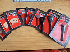 3 Violin Bridges, 3 tail pieces, 3 tuning pegs, idea what size, see pics