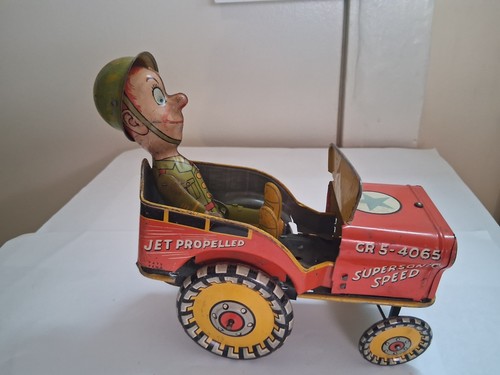 Joe jouncing jeep tin toy - jouncing,