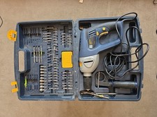 ELECTRIC CORDRD P. PRO HAMMER DRILL 1050  COMPLETE WITH BITS.