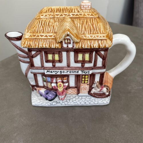 Merry round toys teapot - "merry-go-round,
