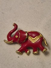 vintage gold-plated elephant brooch with red enamel