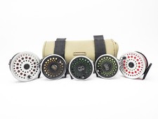 COLLECTION OF FIVE TROUT FLY REELS IN SNOWBEE CASE (LEEDA/ INTREPID/ ETC)