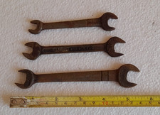 Three slim open ended spanners