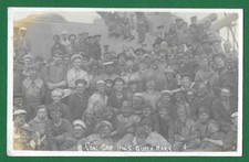 EARLY 20TH CENTURY WWI RP POSTCARD, COAL SHIP HMS QUEEN MARY. SAILORS, CREW.