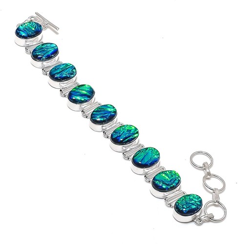 Ammolite oval shape gemstone - shape,