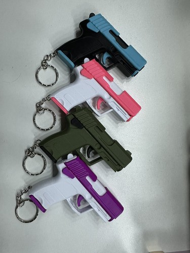 Fidget sliding gun key ring - fidget,
