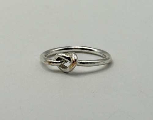 Silver tone knot ring size - silver,