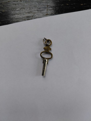 Old pocket watch key - old,