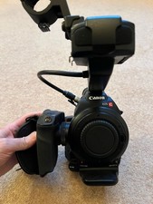 Canon EOS C100 Mark I Cinema Camera with AC Adapter and Battery Pack