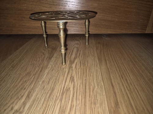 Vintage solid brass trivet