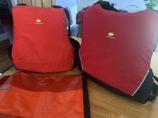 Buoyancy Aids X2. Red.  YAK. One Adult. One Child. Plus one red waterproof bag 