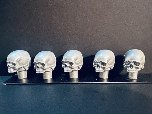 Giger skull magnets - r.,