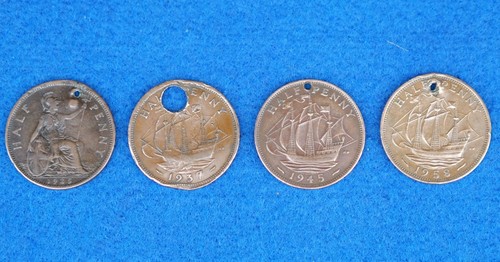 Half penny coin damaged - half,