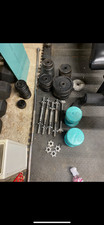 dumbell, barbell, ab roller and weights.