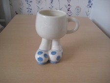Carlton Walking Ware cup -long legs blue spotted shoes.