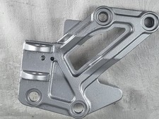 KAWASAKI GEN right hand FOOTREST HANGER PLATE 35011-1245 GPZ600 (Bad Paint Job)