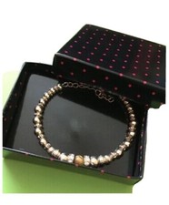 Avon Sosie Bracelet. NEW. Contains genuine Tigers Eye. 