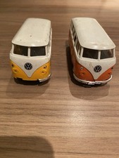 Two Volkswagen Die Cast Vans In Hippy  Design.  11x5x5cm. Pull Back And Release.