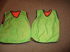 2 training bibs precision reverisble infants numbers green/orange