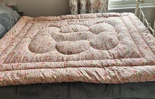 A double eiderdown, vintage, paisley, floral, cotton, feathers.