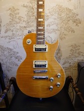 Vintage V100AFD Flamed Amber Paradise Electric Guitar