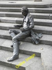 Photo 6x4 Reclining statue of