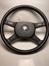 BMW steering wheel, likely from an E30 model or  BMW (E23, E24 E28E32 E34