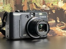 Canon PowerShot G9 point and shoot + charger & 3 batteries 12.1MP 35mm to 210mm