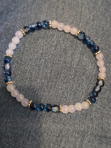 Dark blue and white with - and, gold