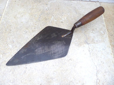 VINTAGE  BRICKLAYERS  TROWEL, Brick trowel. Large / wide. 11" x 5 1/2". Capped.